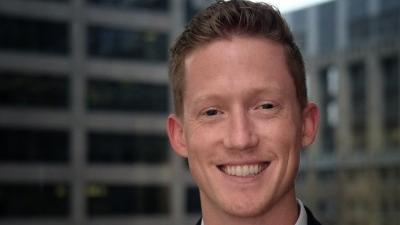 A headshot of Ryan Van Portfliet
