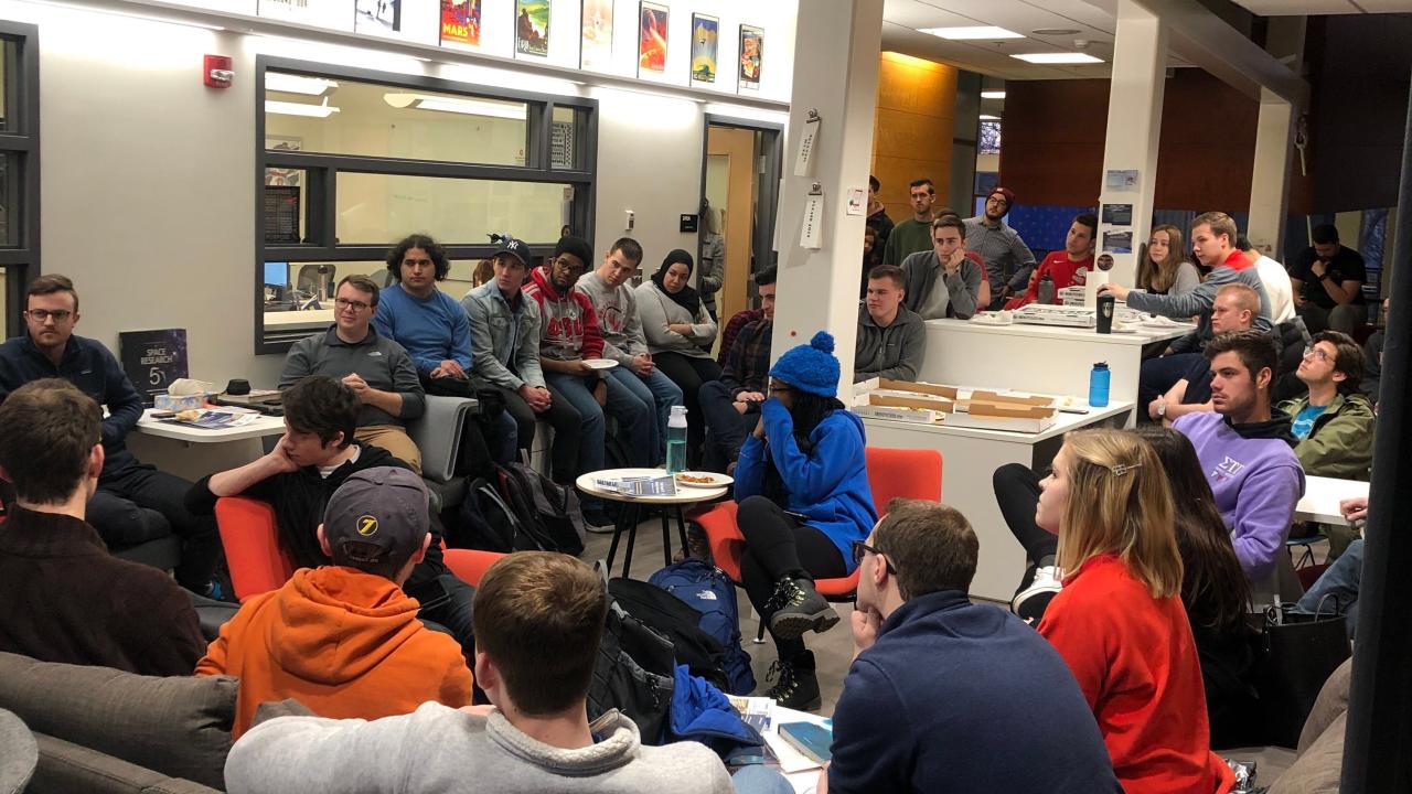 A large group of students gathered at Battelle Center in Page Hall for an event